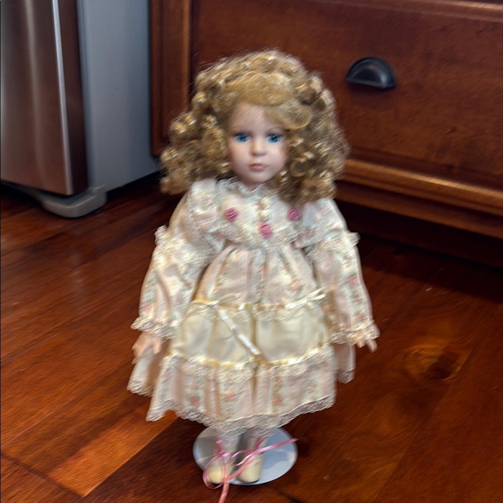 Elegant Cream and Pink Porcelain Doll
